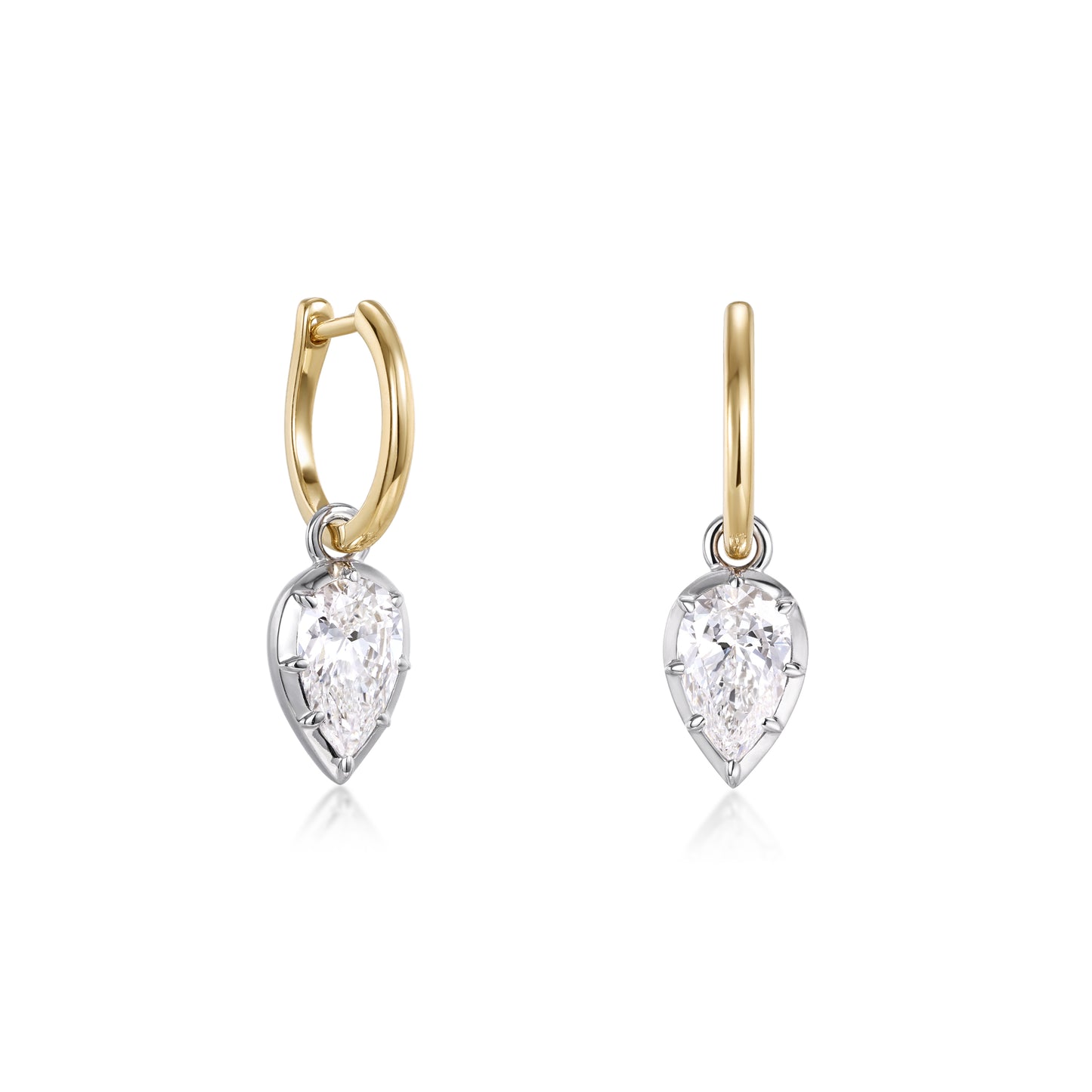 Bezel Pear Diamond Drop Hoop Earrings showcasing pear shaped diamonds in white gold and yellow gold hoops.