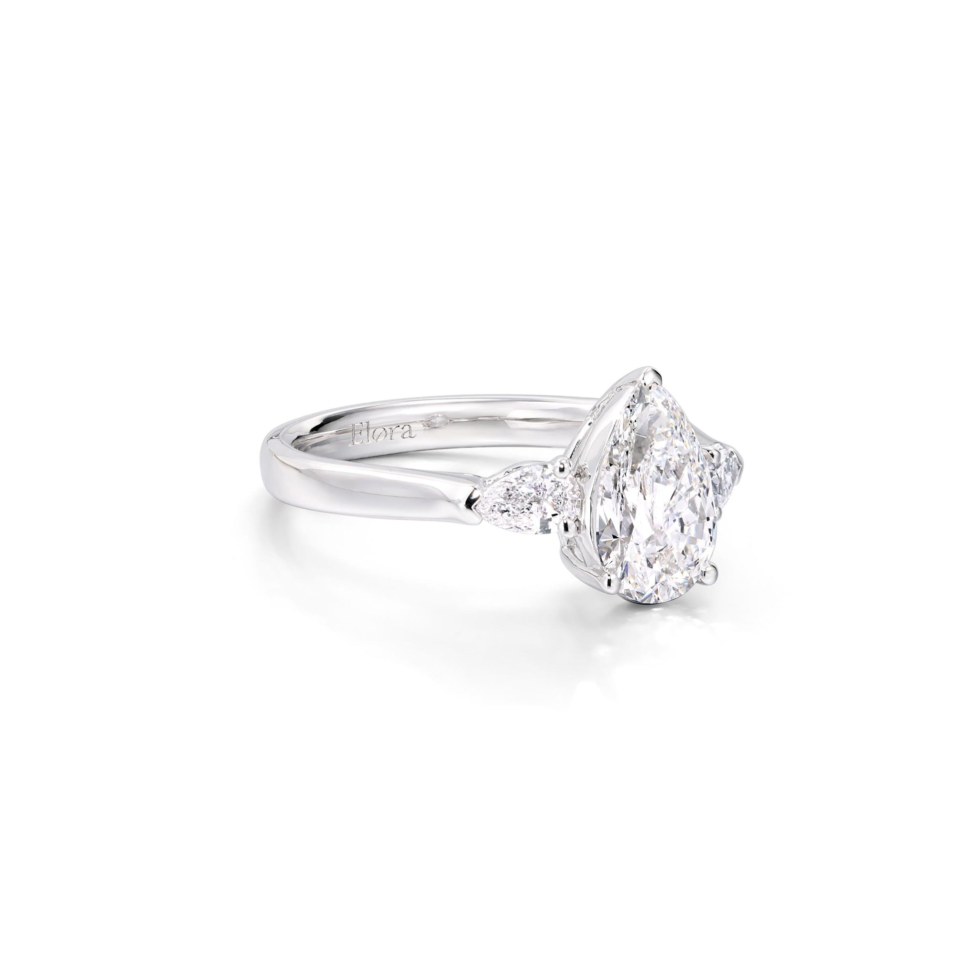 Angled View Pear Cut Lab Grown Diamond Three Stone Engagement Ring in Platinum | Gracie | Elora