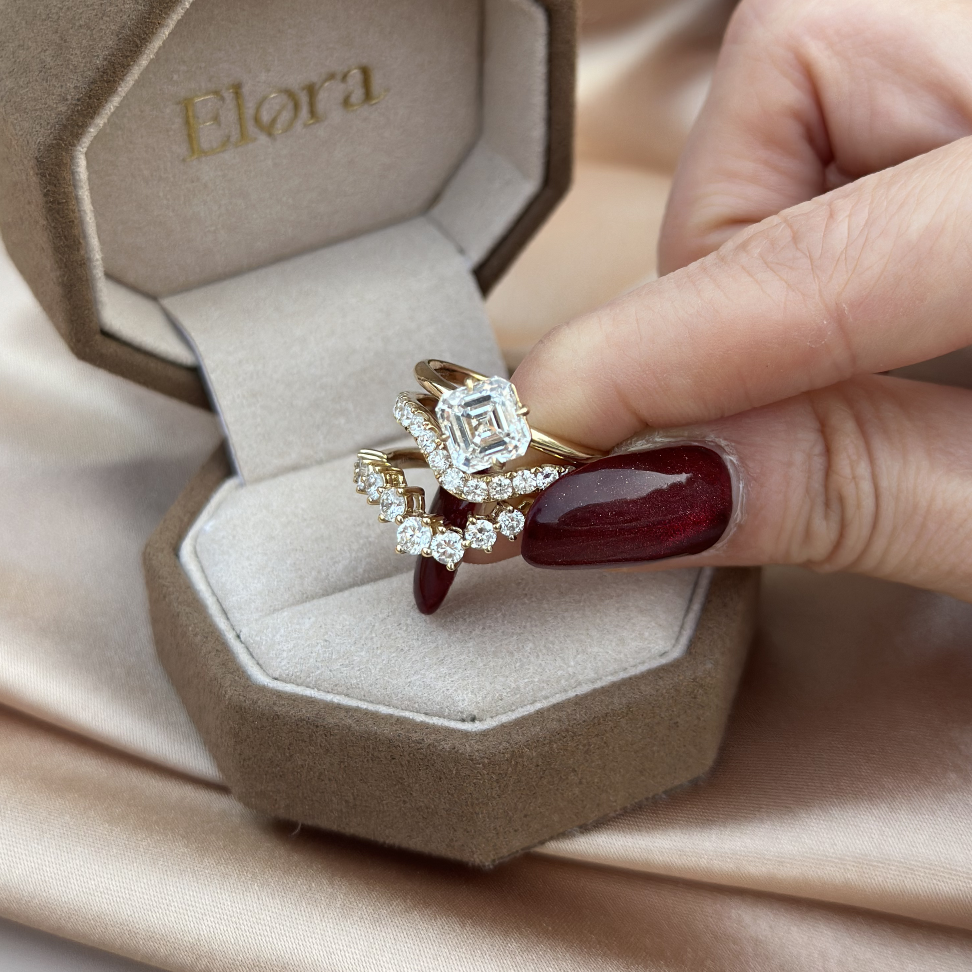 Asscher Cut Lab Grown Diamond Ring displayed in Elora velvet ring box with stacked band