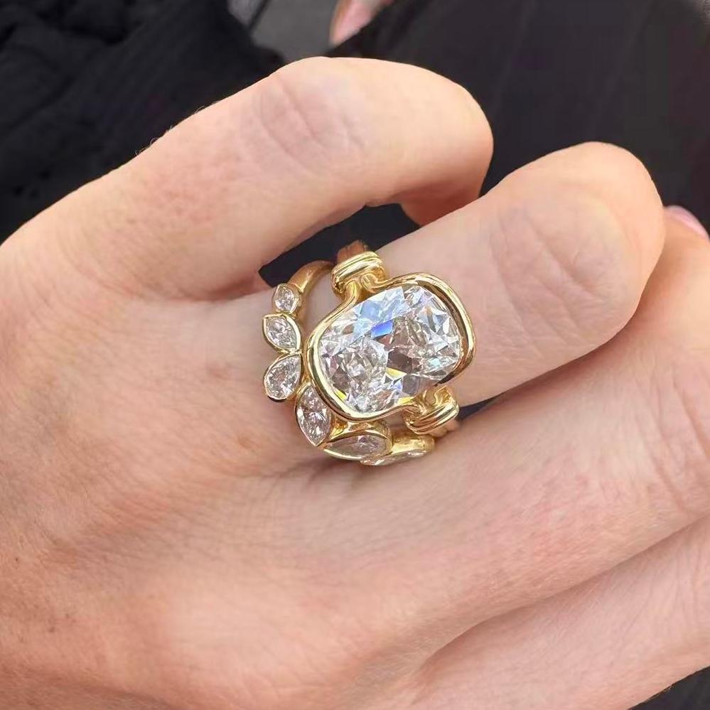 Custom Order Deposit - 4ct OMC Lab Diamond in Athena Setting on a hand with gold band and diamond accents.