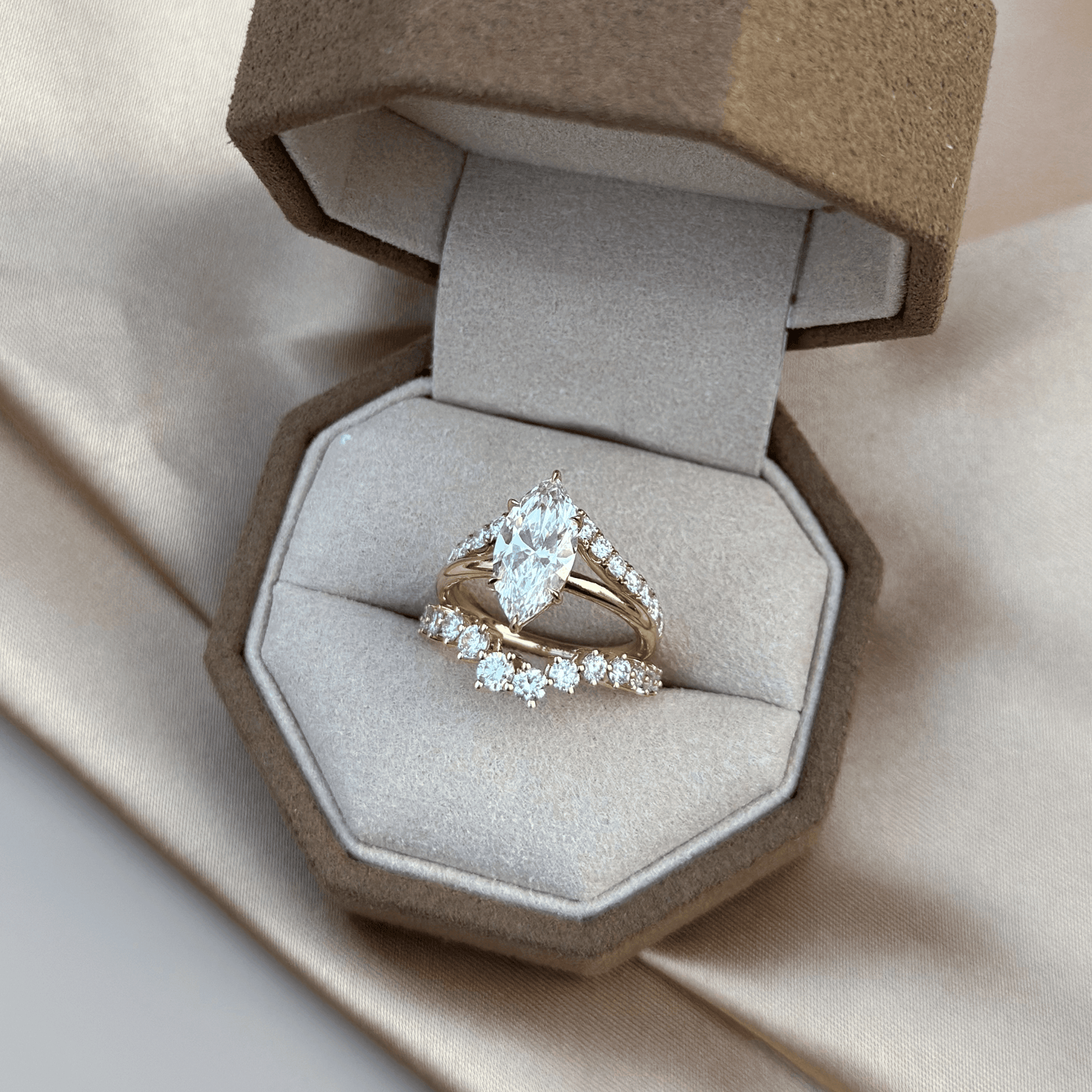 Bold stacked ring look with Elena Marquise cut ring paired with pavé and plain bands