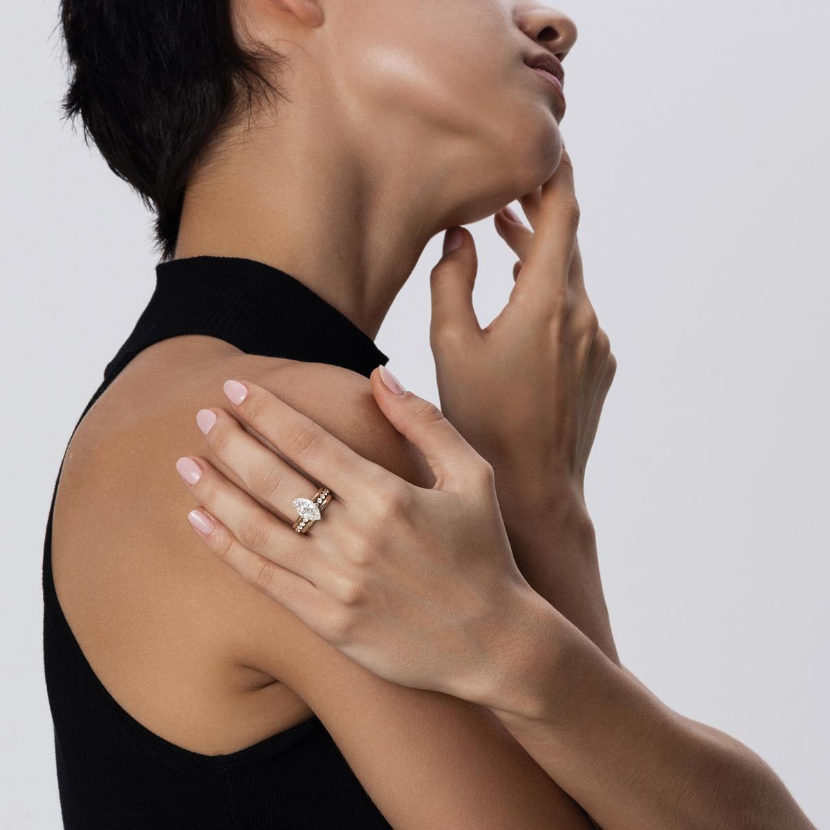 Bold stacked ring look with Marquise Cut Diamond ring paired with pavé and plain bands