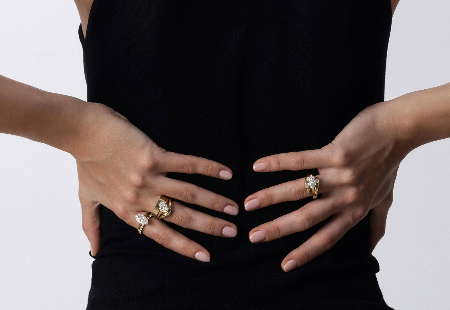 Bold stacked ring look with Solitare diamond ring paired with pavé and Curved bands, Plain gold ring