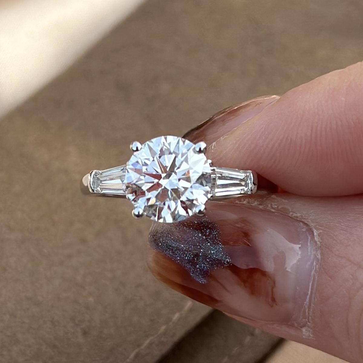 Detail-closeup Three-Stone Round Cut Lab Grown Diamond Engagement Ring in platinum