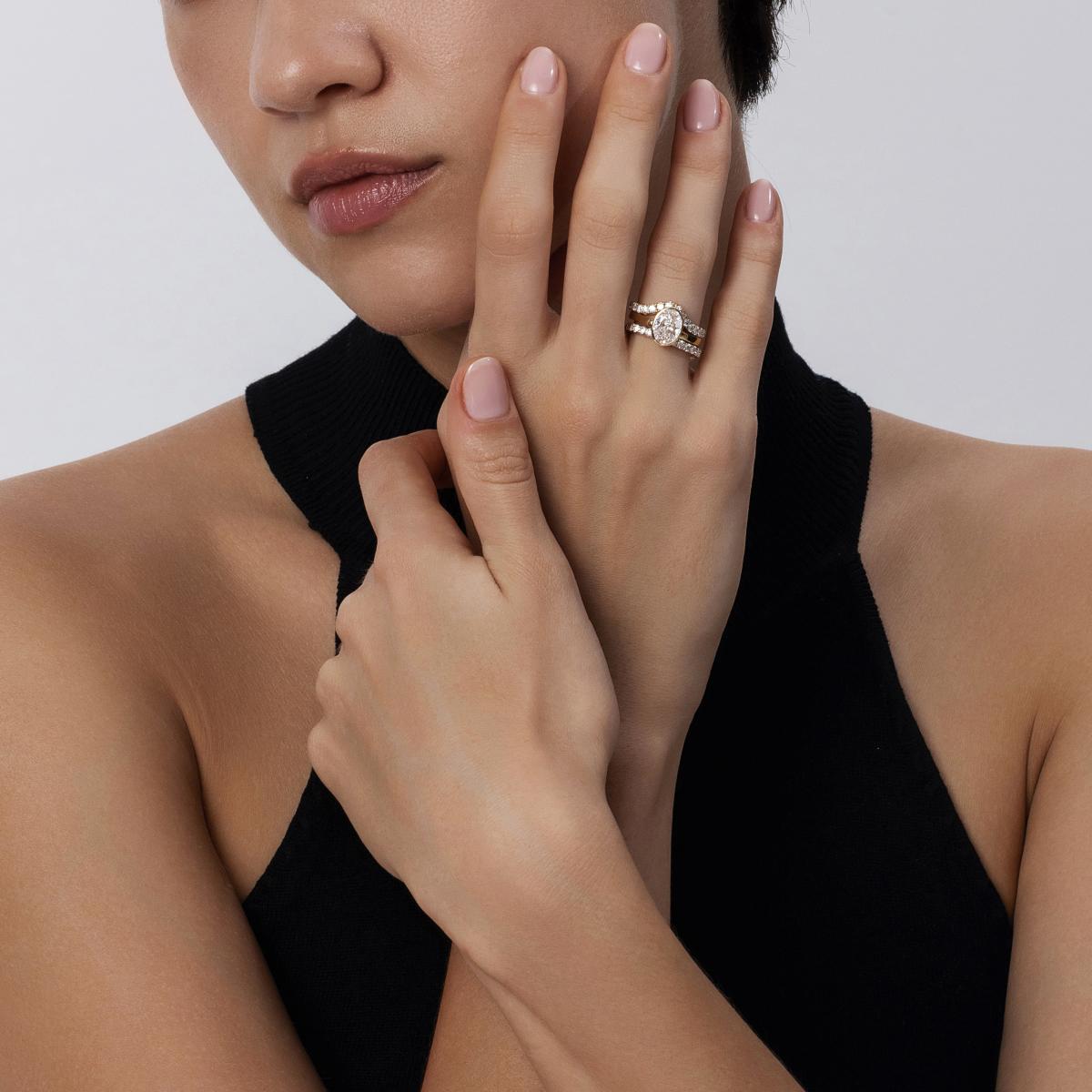Eleanor Oval Cut Lab Grown Diamond styled in a modern ring stack with contour and pavé bands
