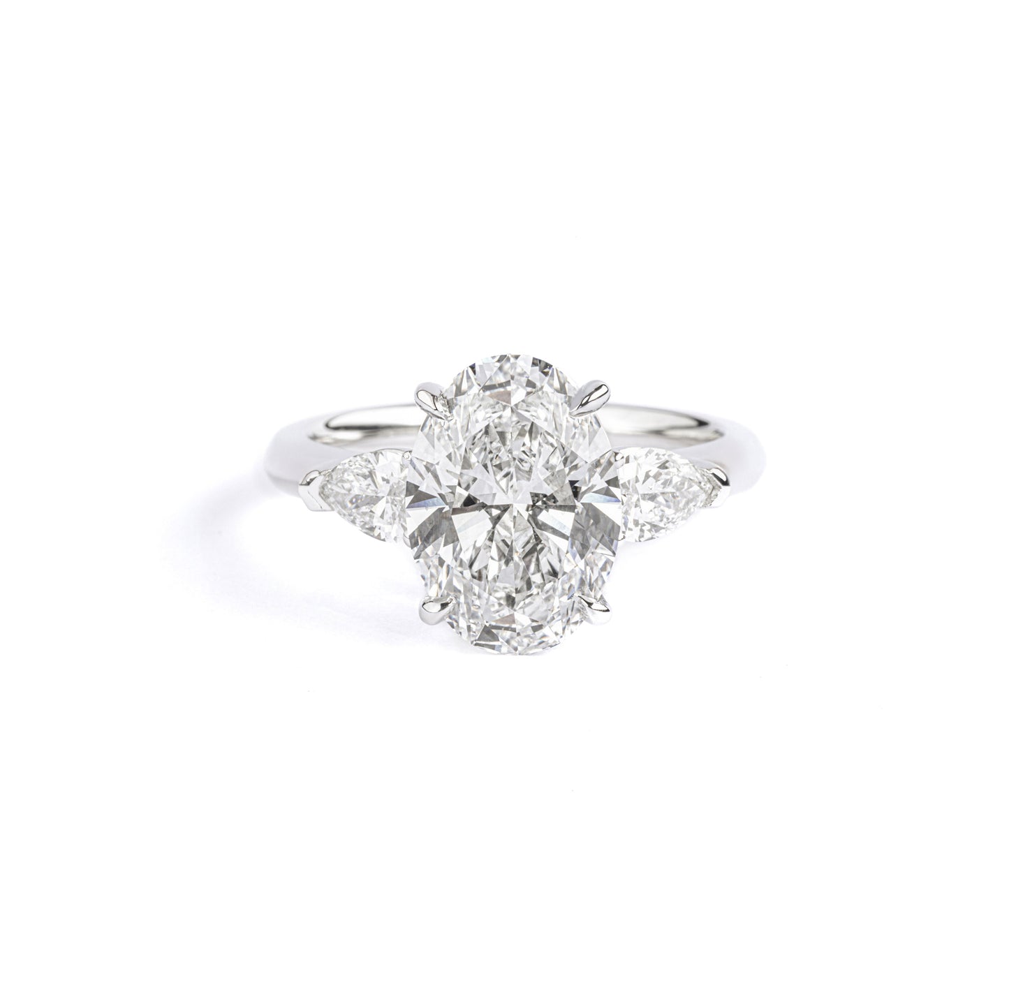 Front View Three-Stone Oval Cut Lab Grown Diamond Engagement Ring in platinum