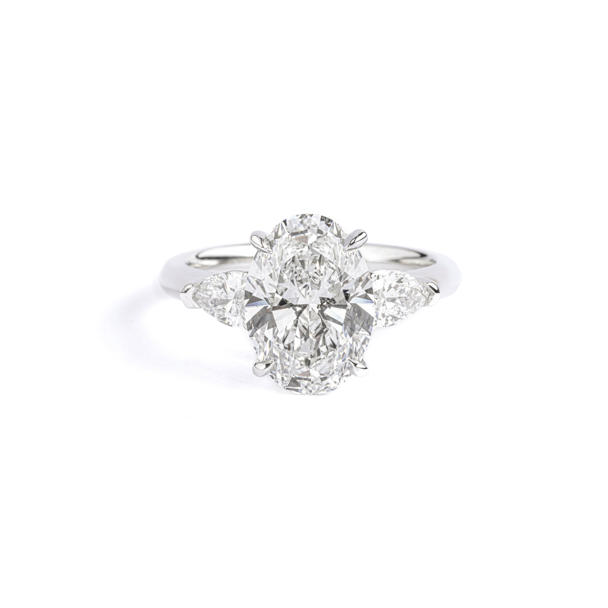 Front View Three-Stone Oval Cut Lab Grown Diamond Engagement Ring in platinum