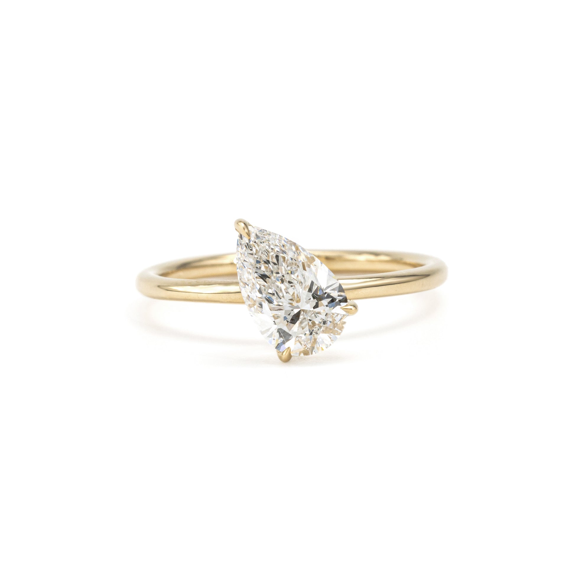 Front view Tilted Pear Cut Lab Grown Diamond Solitaire Engagement Ring in 14K Gold