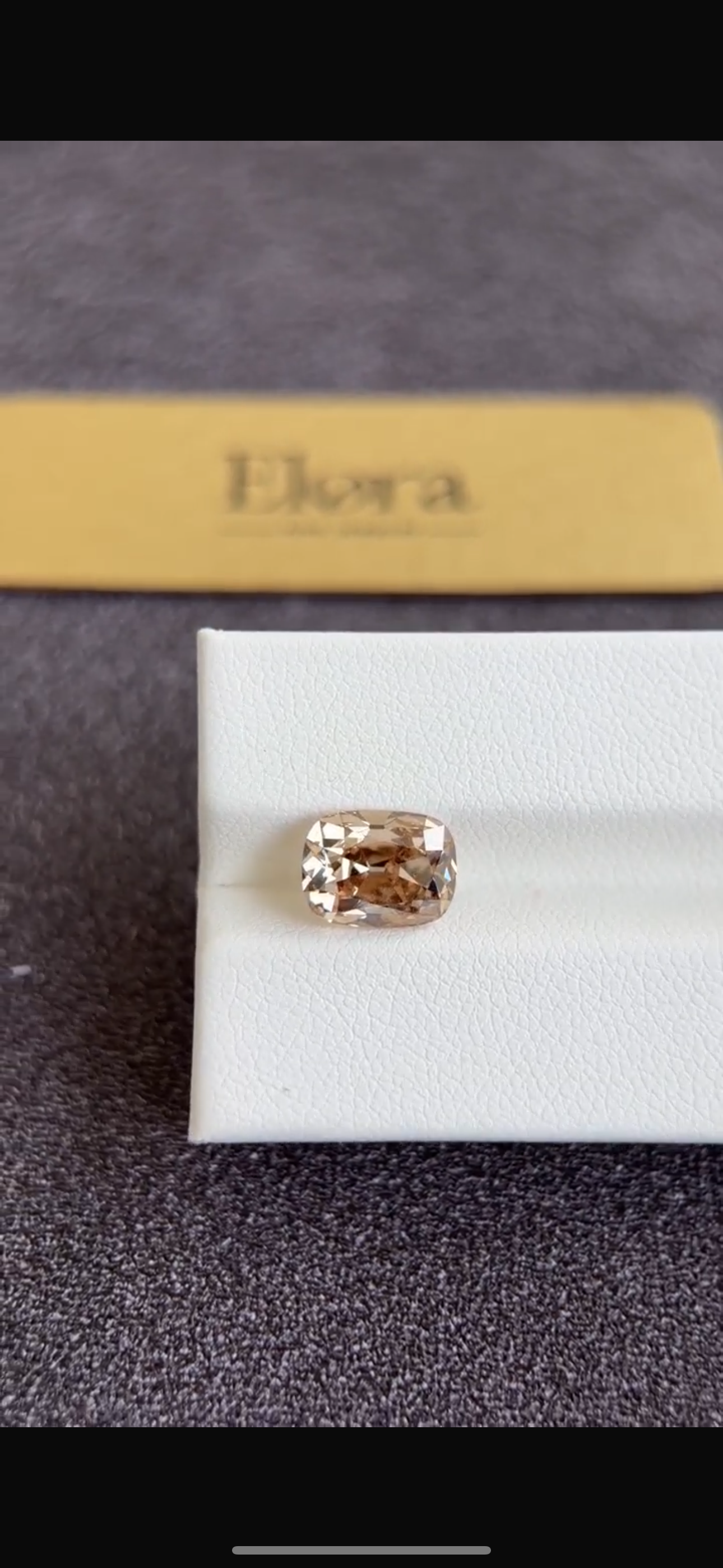2.455 carat champagne color stone with 14k yellow ring setting