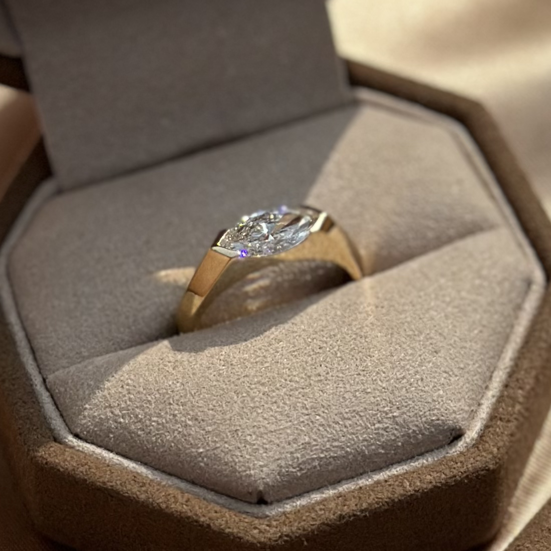 Josie Marquise cut diamond ring shown inside Elora jewelry box