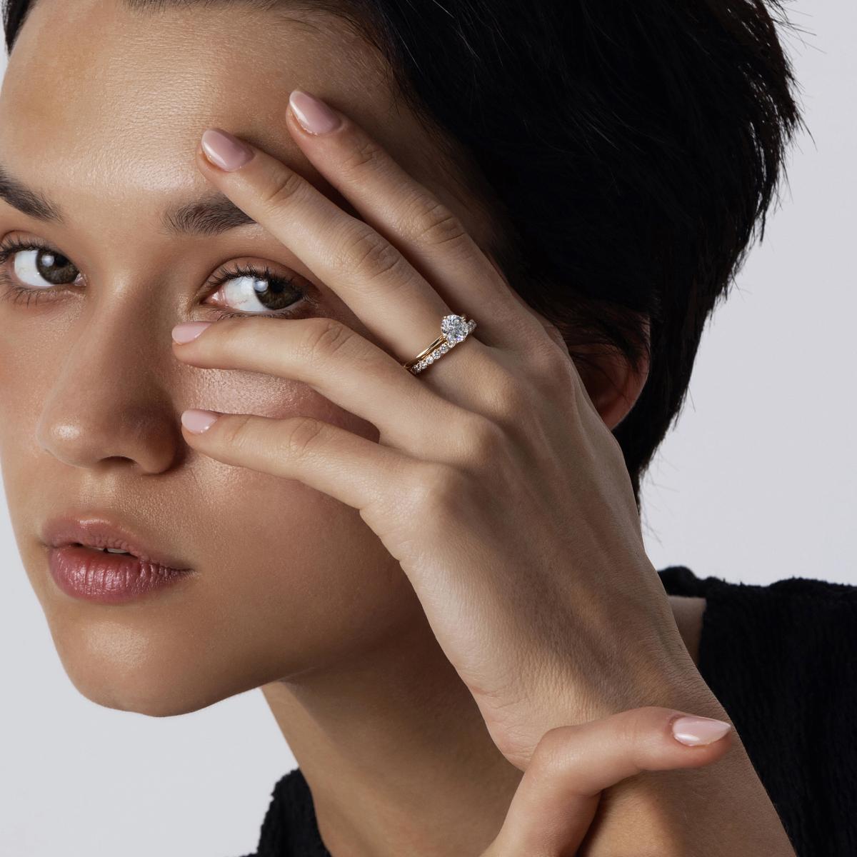 Layla Round cut diamond solitaire ring stacked with an eternity band