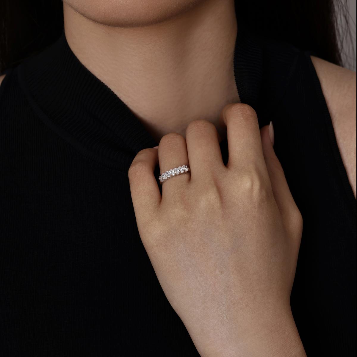 Model wearing 0.65ctw Oval Cut Diamond Half Eternity Band