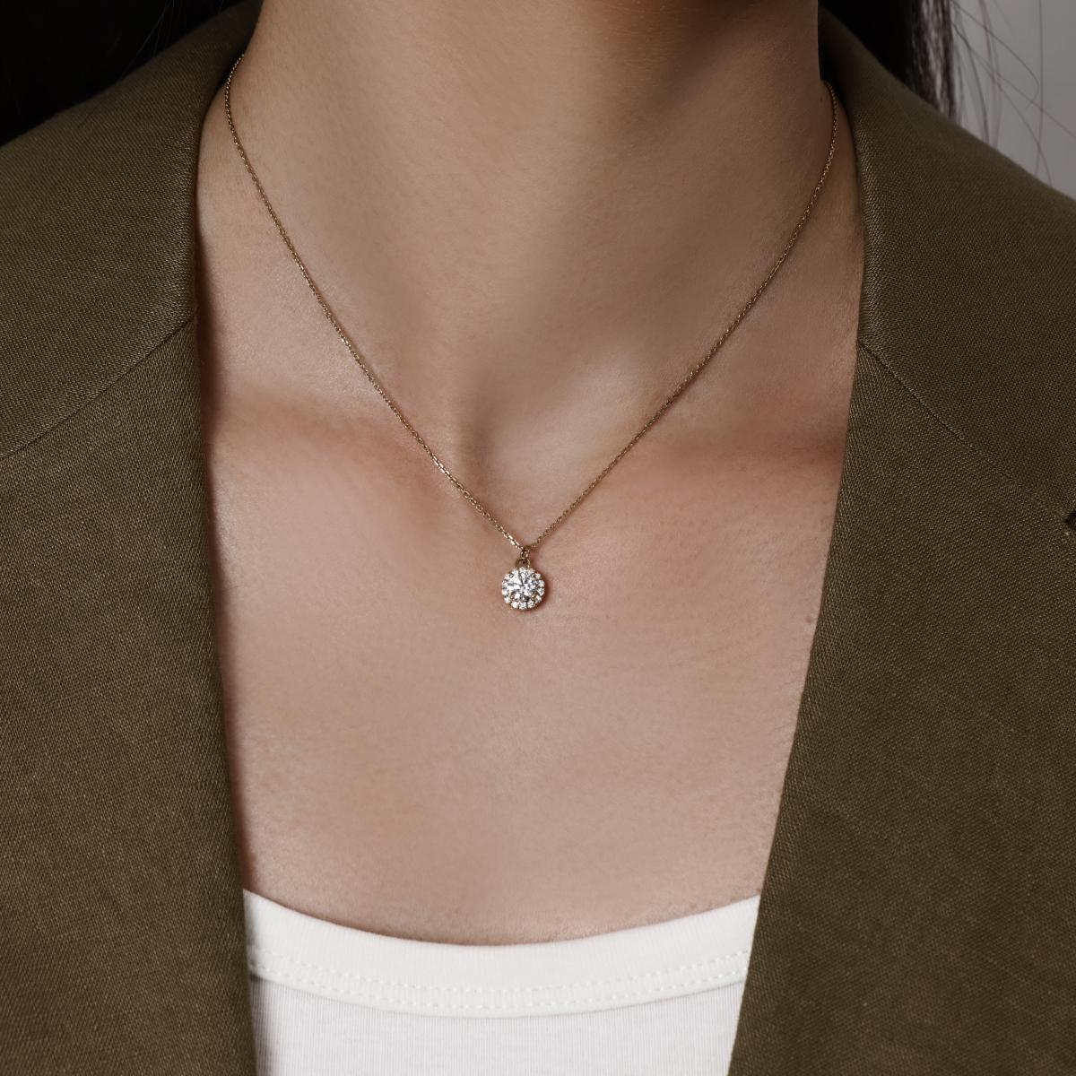 Model wearing A Halo Round Cut Diamond Pendant Necklace 16–18" Chain Length (adjustable)