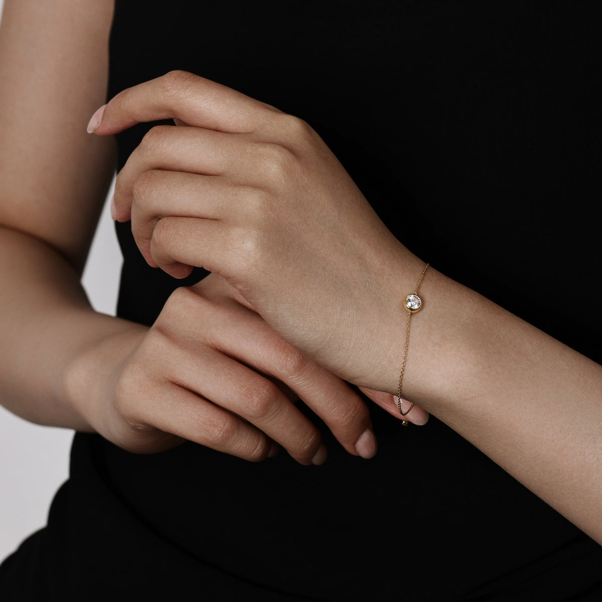 Model wearing a Bezel Round Cut Diamond Bracelet 6.5" Bracelet Length (165mm)