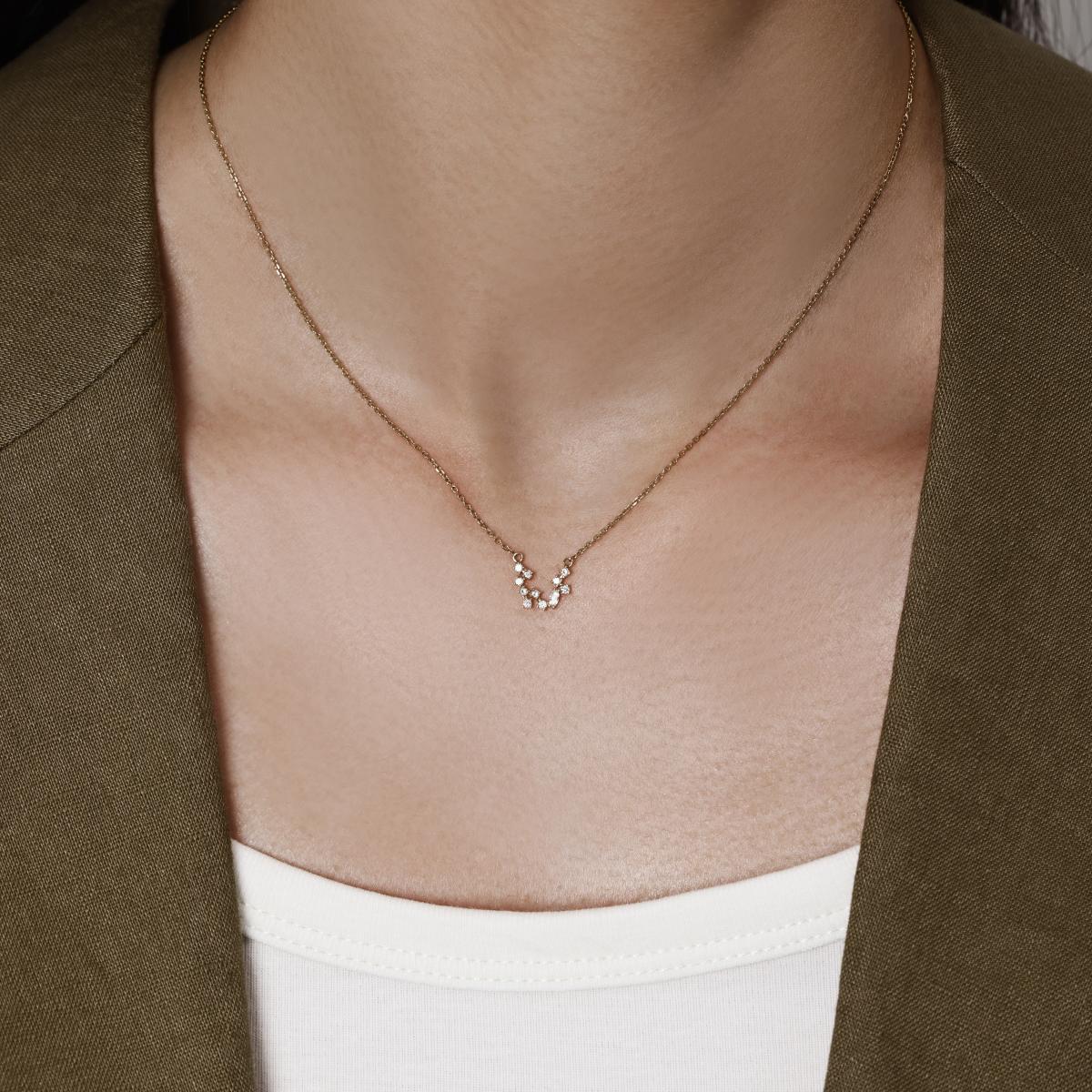 Model wearing a Diamond Necklace Cluster of round and marquise-cut diamonds 16–18" Chain Length (adjustable)