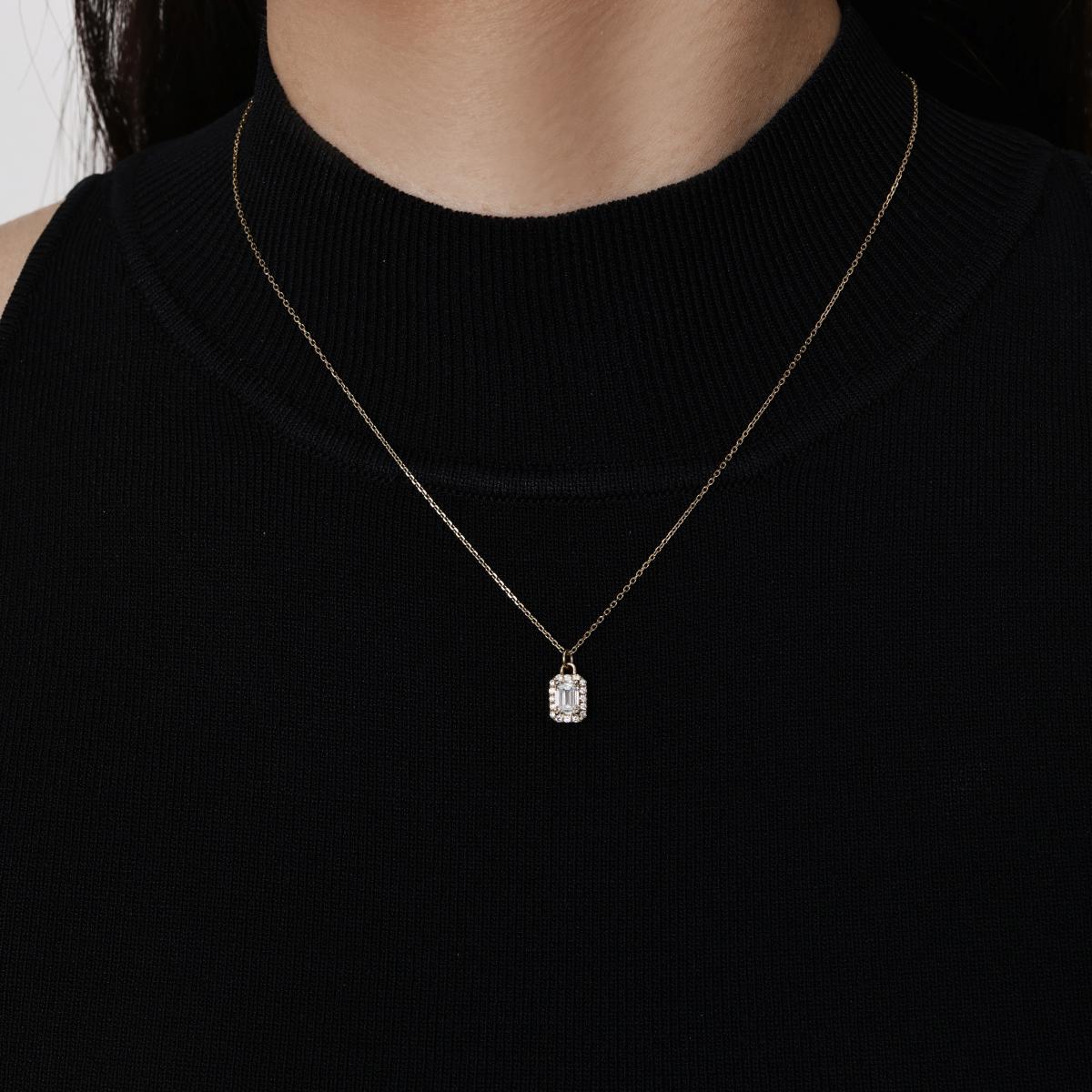 Model wearing a Halo Emerald Cut Diamond Pendant Necklace 16–18" Chain Length (adjustable)