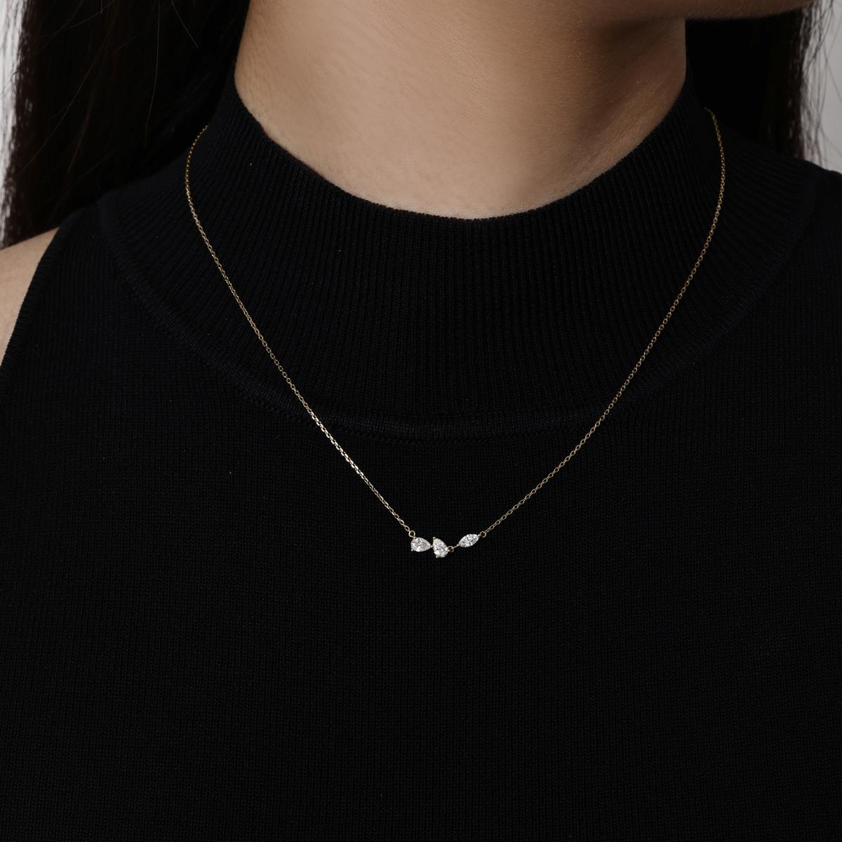 Model wearing a Trio of Pear & Marquise Cut Diamond Necklace 16–18" Chain Length (adjustable)