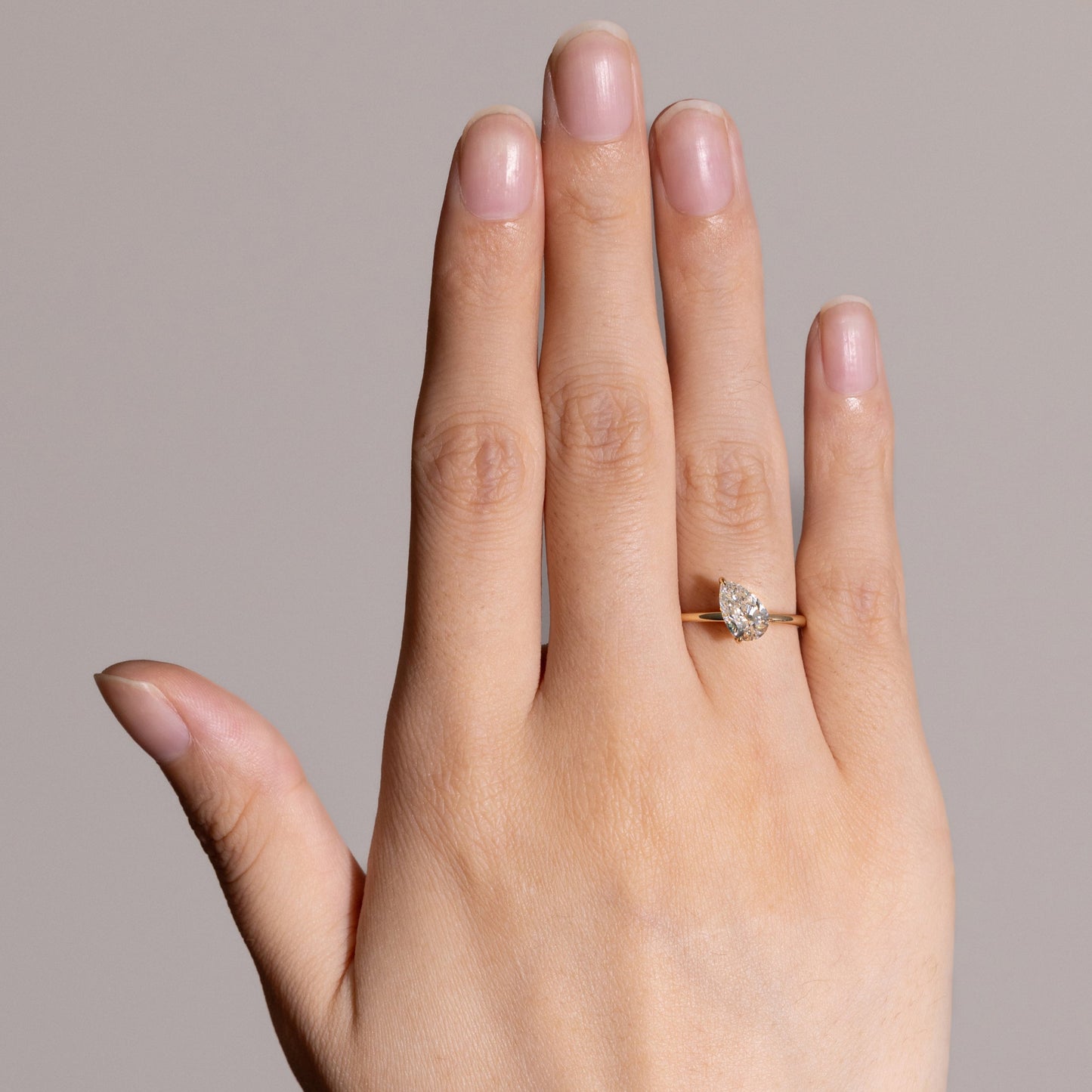 On-hand view 1ct Pear Cut Lab Diamond Engagement Ring