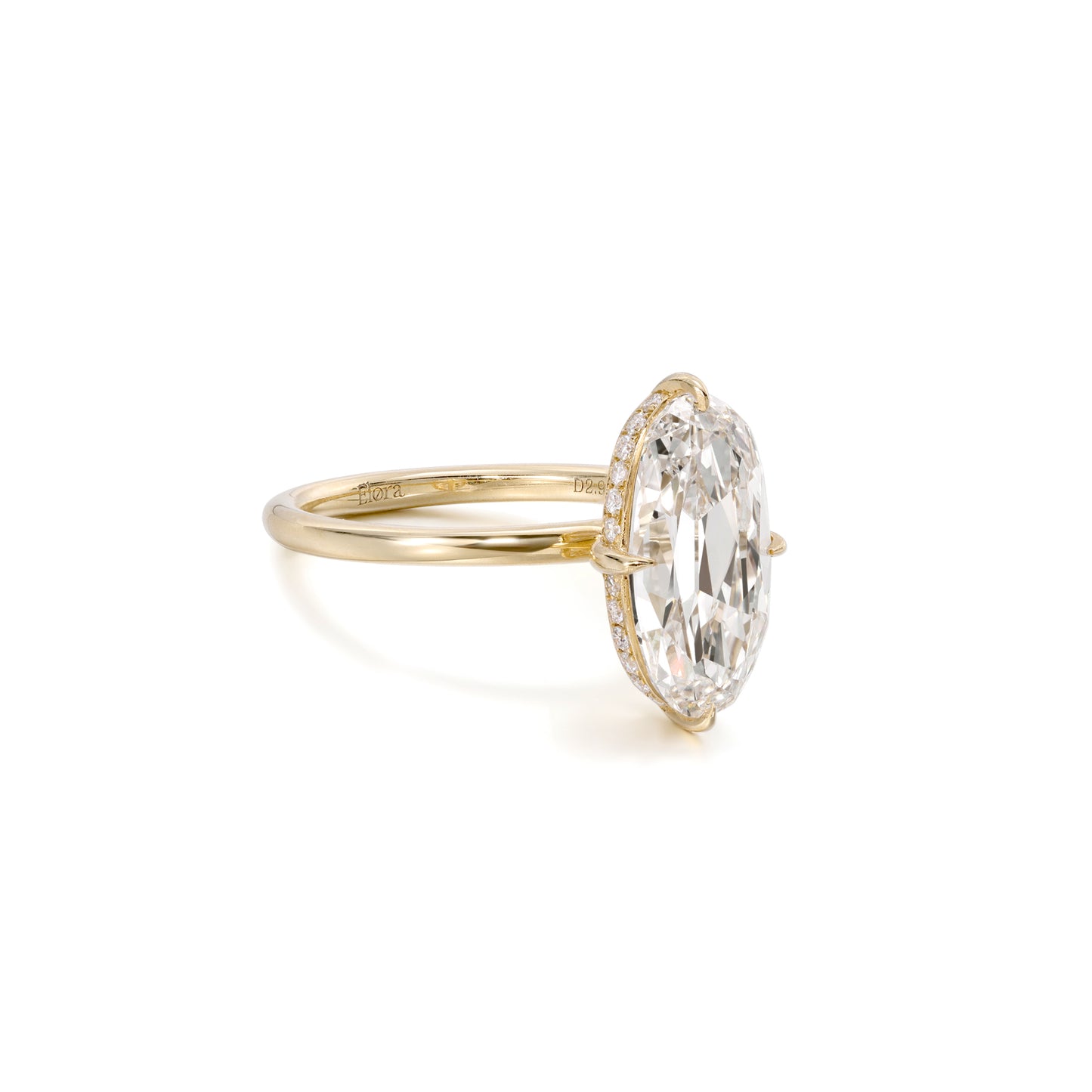 Side profile showing the sparkle Hidden Halo setting of Belle Moval cut diamond ring
