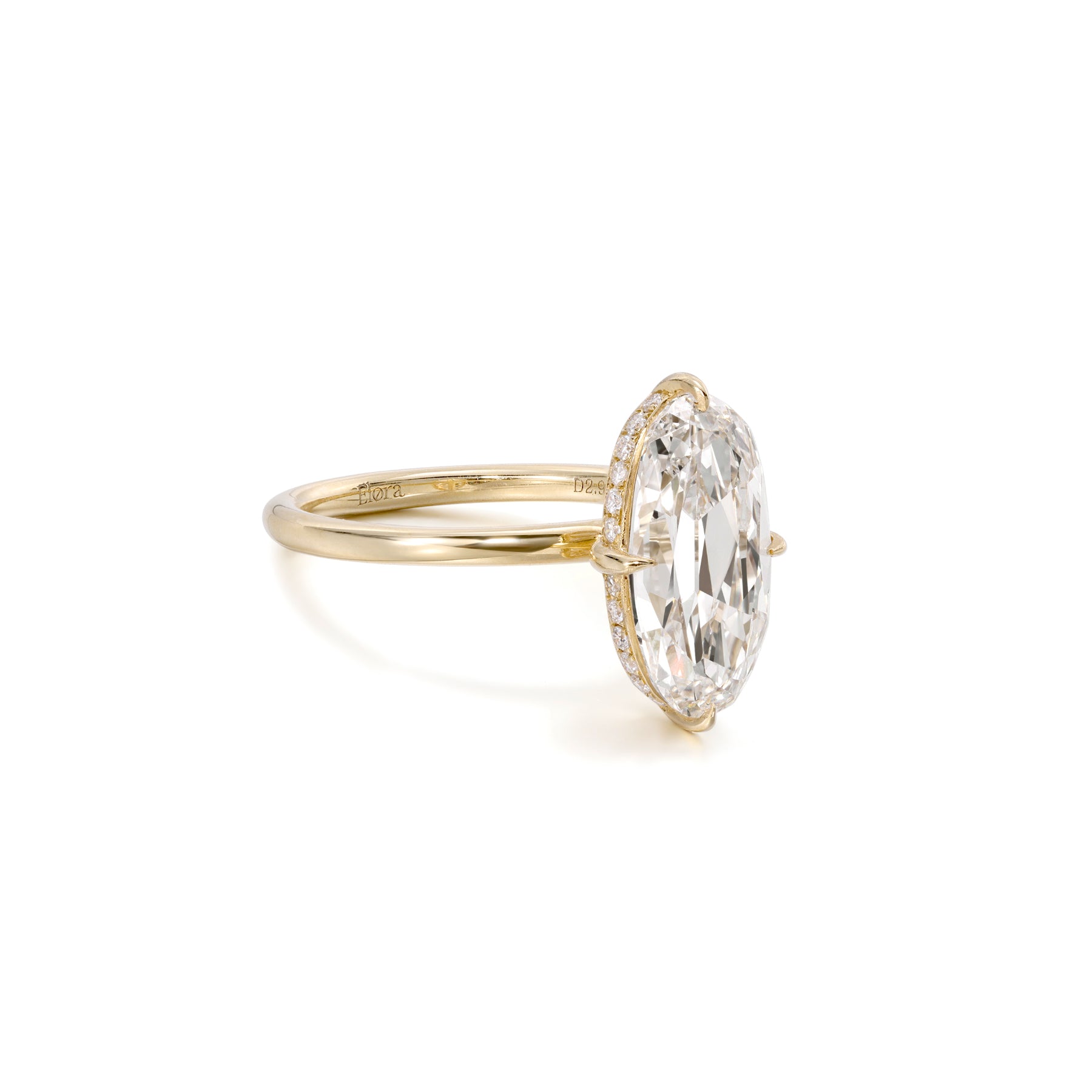Side profile showing the sparkle Hidden Halo setting of Belle Moval cut diamond ring