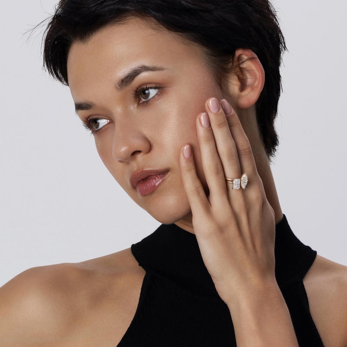 Stacked look featuring Nora Radiant Cut diamond ring with a Marquise Cut Ring