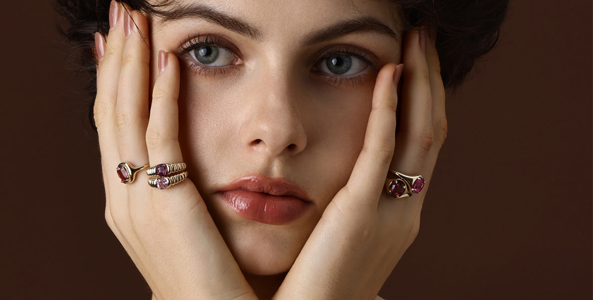 Elegant model showcasing stunning rings featuring Gemstone Spinel, highlighting its vibrant colors and unique design.
