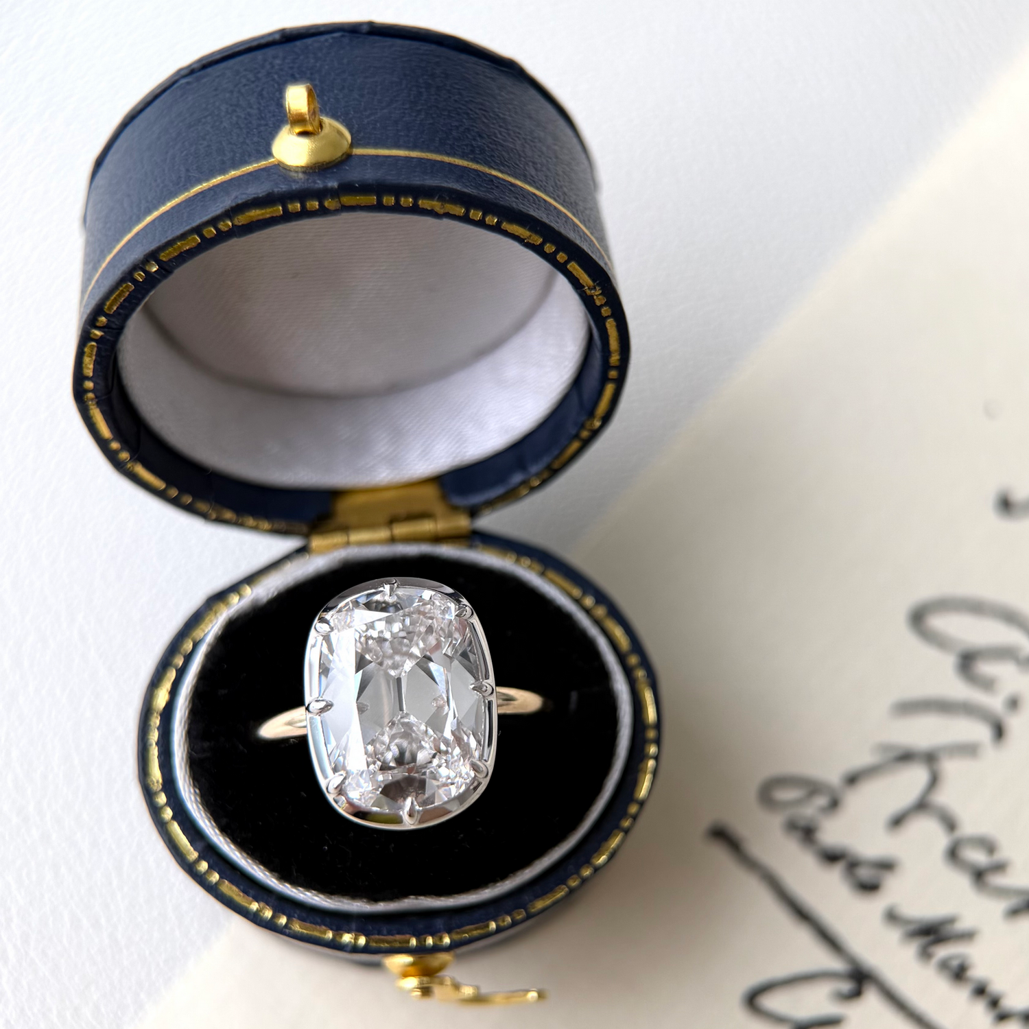 White Gold Engagement Ring featuring a lab grown diamond set in a two-tone yellow gold and white gold design.
