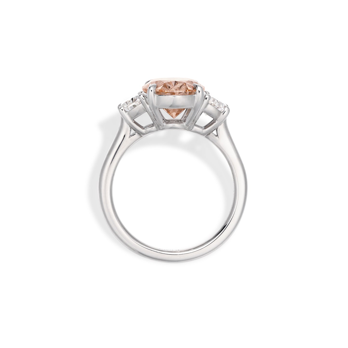 Side profile of pink oval cut lab grown diamond ring with half-moon diamond side stones