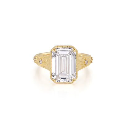 Aurelia-Emerald Cut Lab Grown Diamond Engagement Ring with yellow gold band and intricate milgrain detailing.