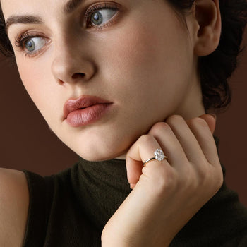 Front View Emerald Cut Lab Grown Diamond Solitaire Ring in four-prong setting