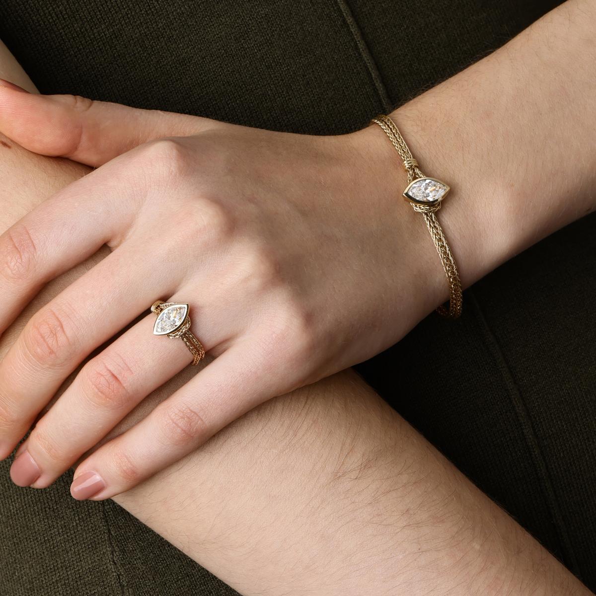 Model wearing the Faith marquise cut lab grown diamond bracelet with matching ring