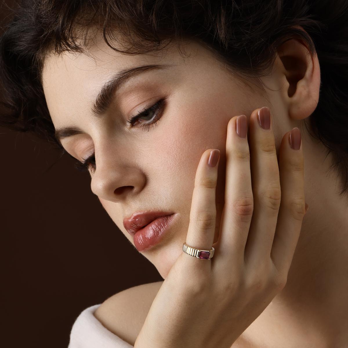 Model wearing Emerlad Cut Pink Tourmaline Ring in 14K Yellow Gold
