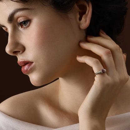 Cushion Cut Deep Purple Spinel Gemstone Ring in 14K yellow gold worn on hand