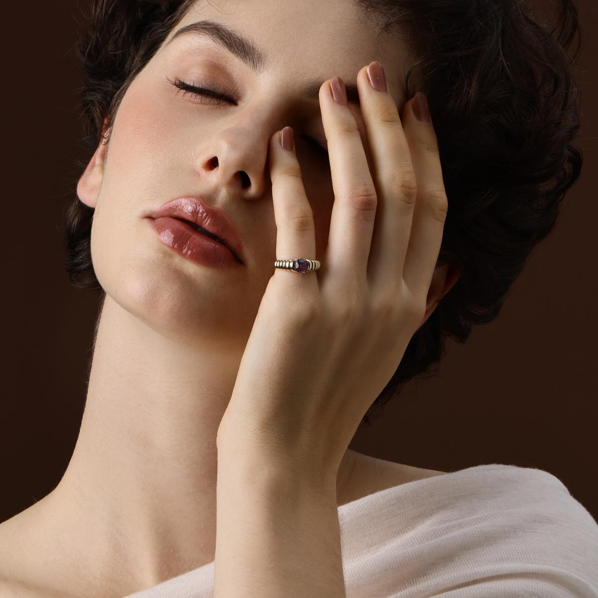 Model wearing the Raelynn Cushion Cut Deep Purple Spinel Gemstone Ring as a pinky ring