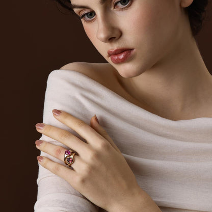 Model Wearing the Evie Oval Cut Lab Grown Pink Sapphire Ring with an other gemstone ring 