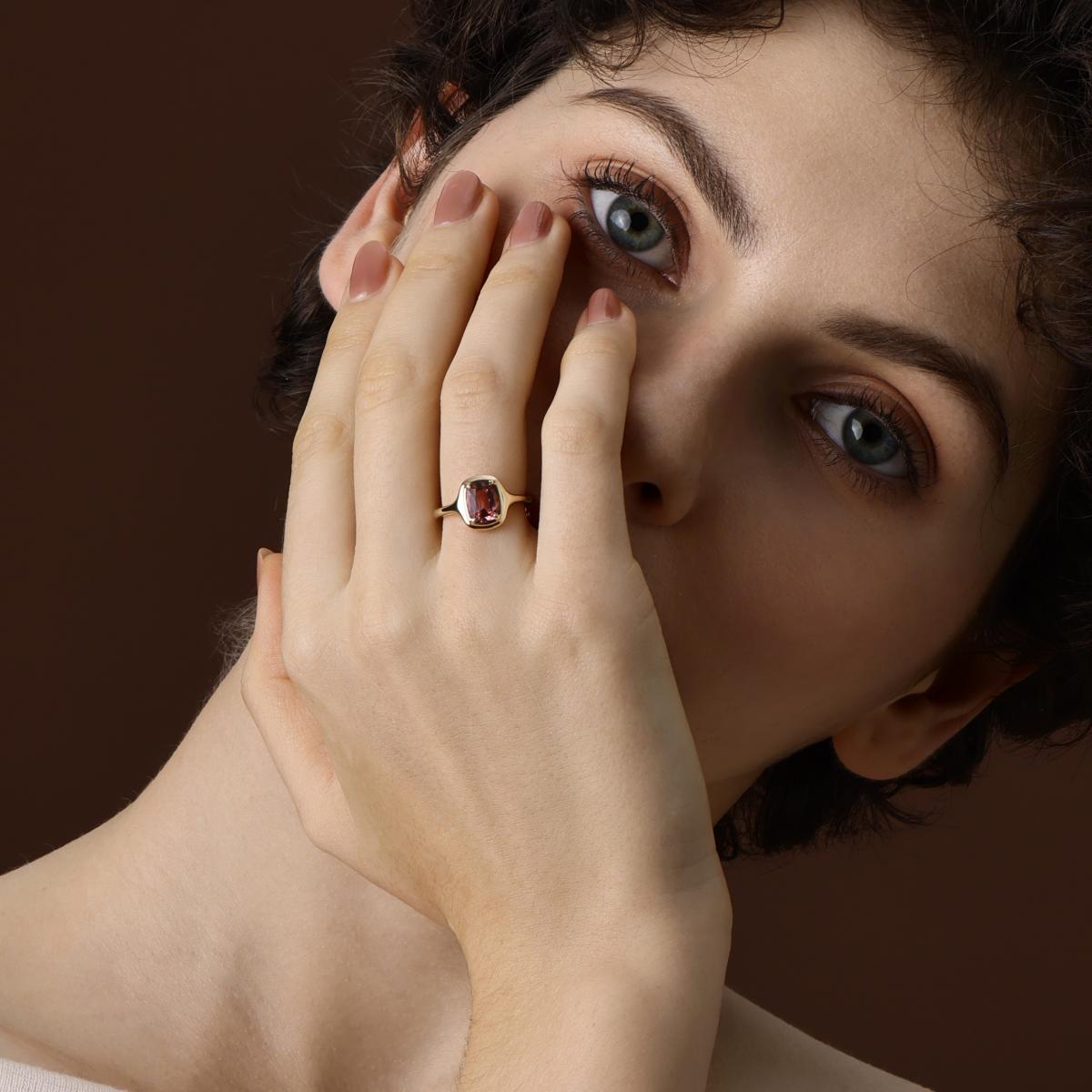 Model Wearing Cushion Cut Light Pink Tourmaline Ring in yellow gold