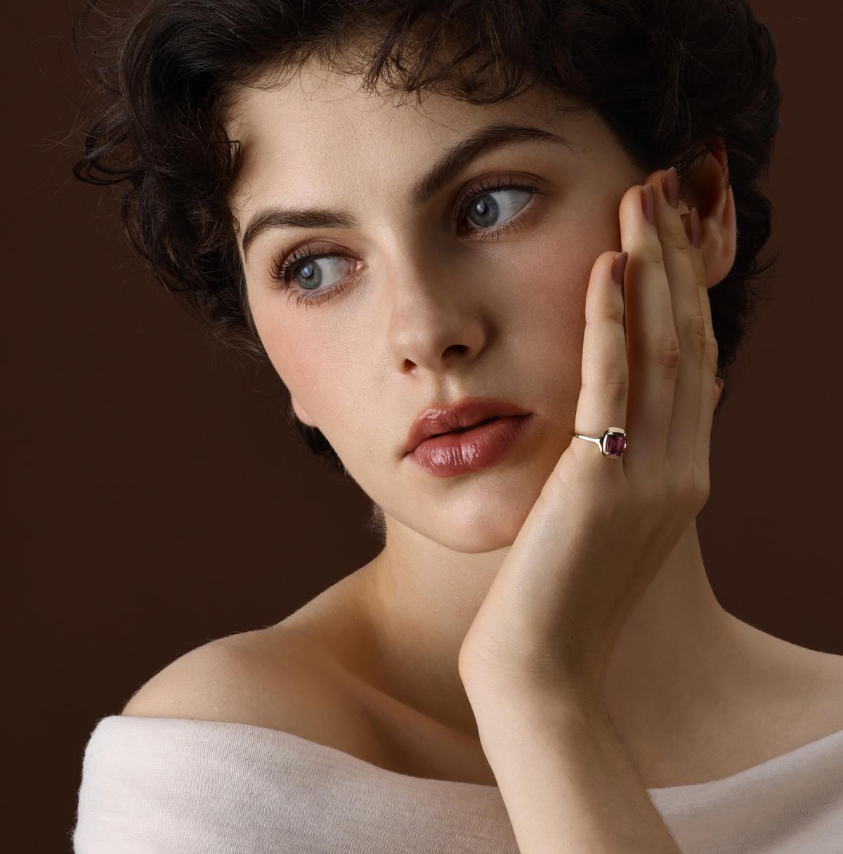 Model wearing the Ellie Cushion Cut Pink Tourmaline Ring in yellow gold