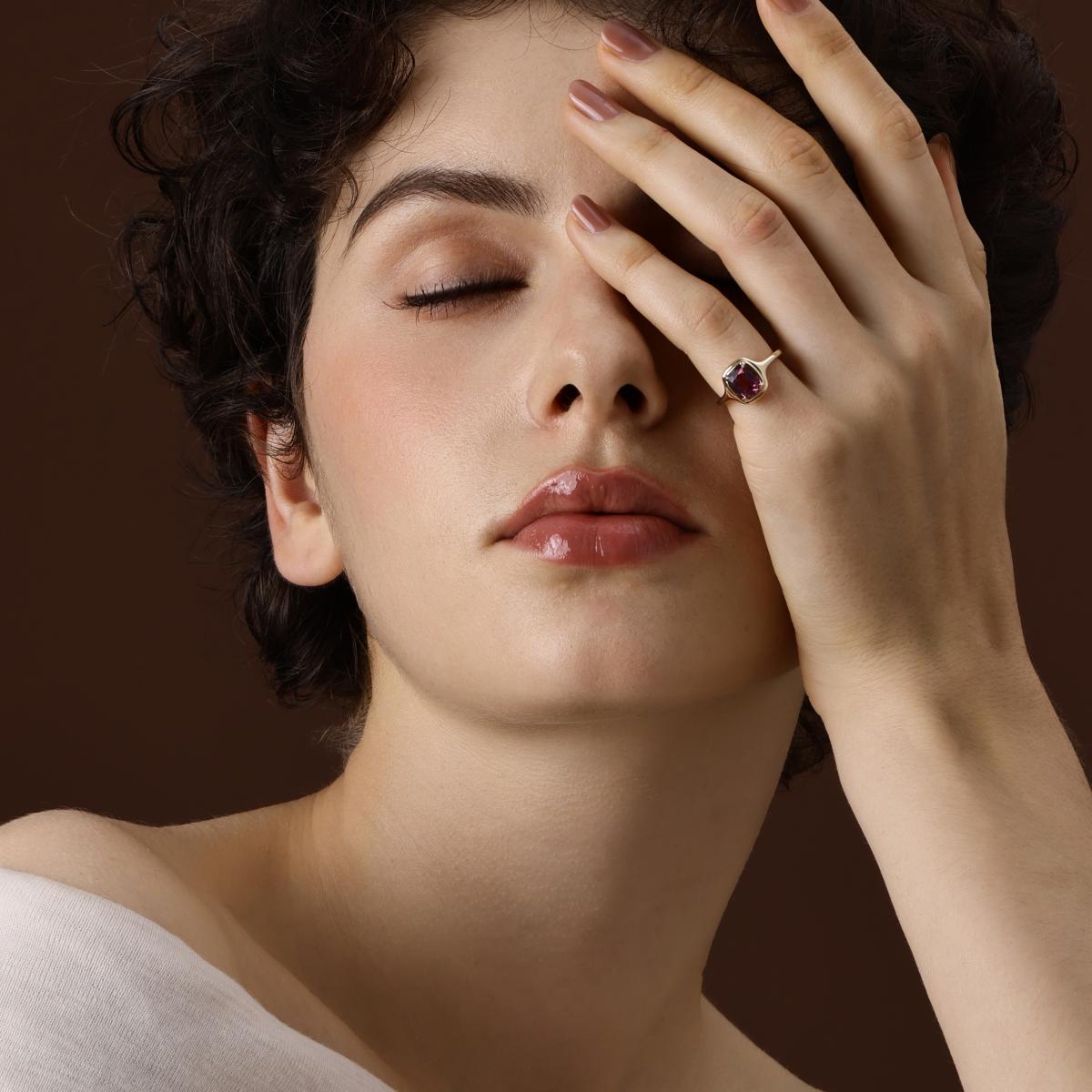 Model wearing the Ellie Cushion Cut Pink Tourmaline Ring as a pinky ring