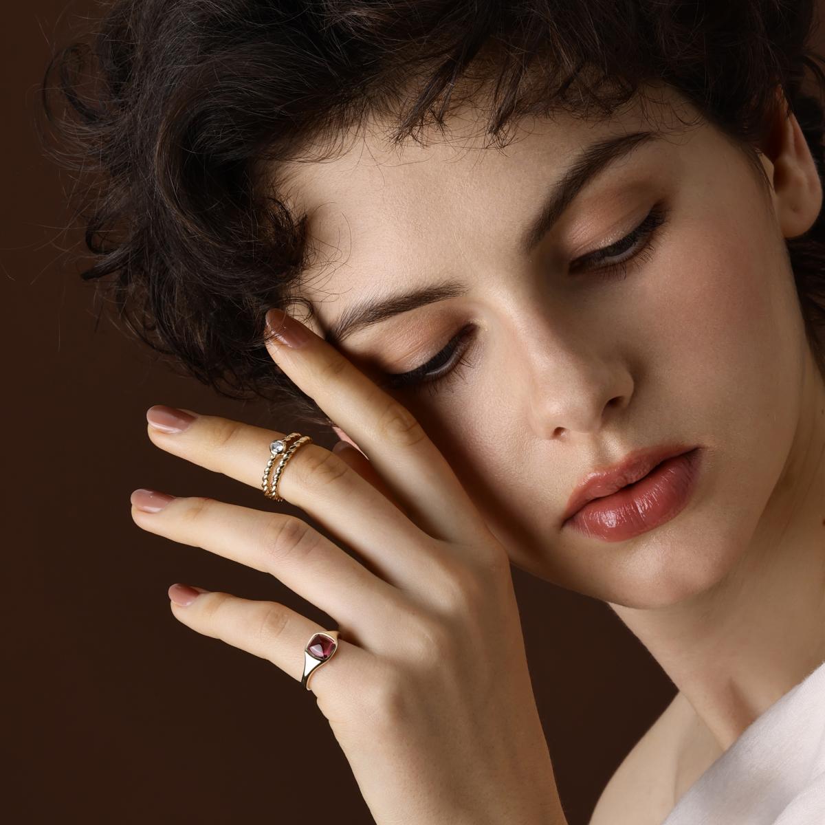 Model wearing the Sarah Sugarloaf Cabochon Reddish Pink Tourmaline Ring