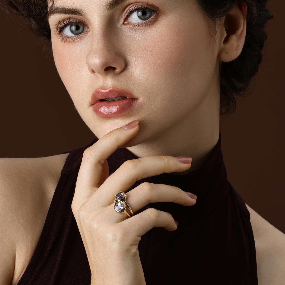 Model Wearing 2 Cushion cut purple spinel rings
