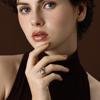 Model Wearing 2 Cushion cut purple spinel rings