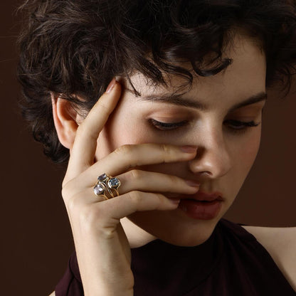 Model Wearing the Ellie Cushion cut light purple spinel ring styled with other rings