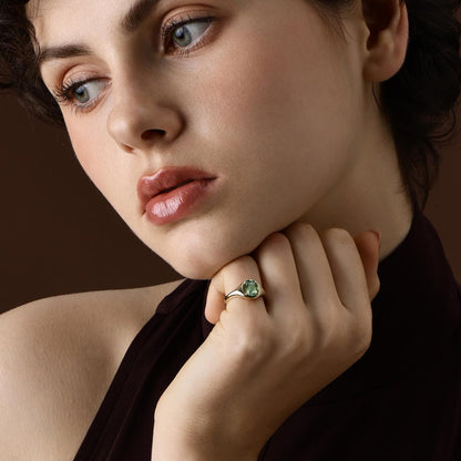 Model wearing Oval Cut Green Tourmaline Ring as a pinky ring