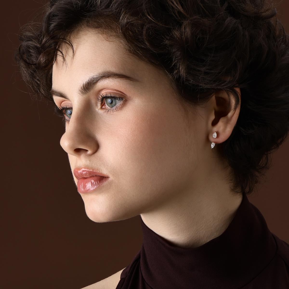 Model wearing Double Pear Diamond Jacket Earrings in 14 Yellow Gold