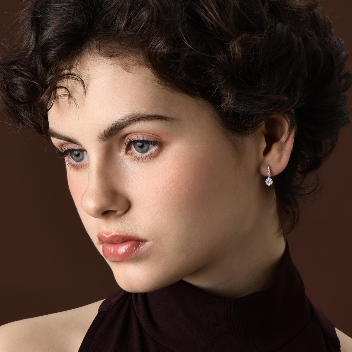 Model wearing Classic Round Diamond Drop Earrings in Platinum