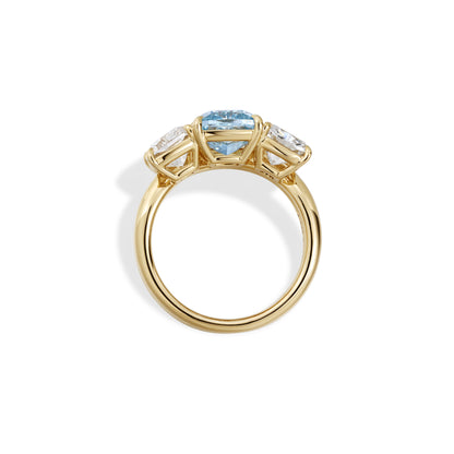 Sage-Blue Cushion Lab Grown Diamond Trilogy Engagement Ring in 14K yellow gold with three stunning stones.