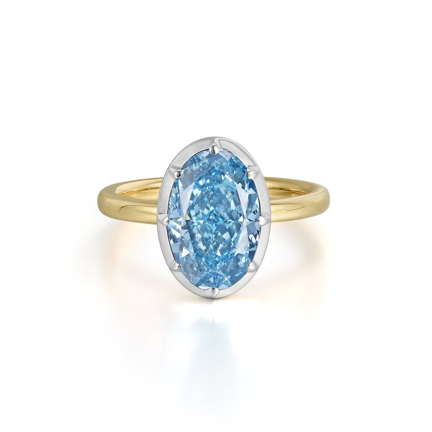 Skye-Blue Oval Lab Grown Diamond Engagement Ring featuring a fancy vivid blue diamond in 14K yellow and white gold.
