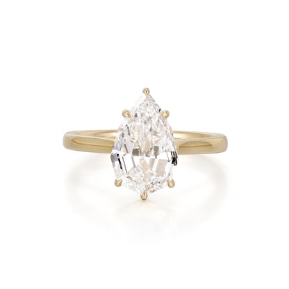 Step cut pear lab grown diamond engagement ring in yellow gold with floral basket setting