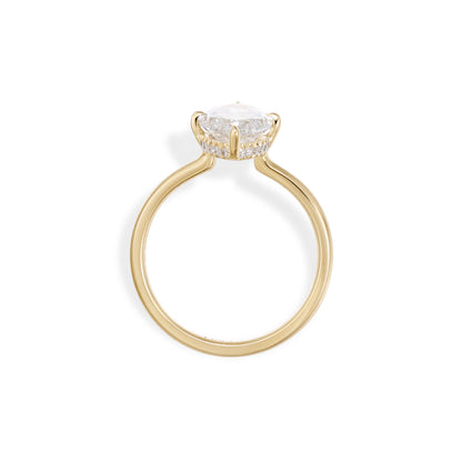 Side profile of marquise cut lab grown diamond engagement ring with hidden halo and slim gold band