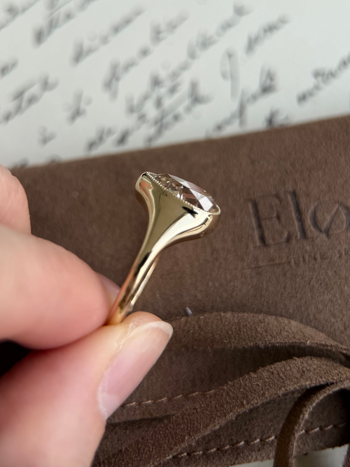 Eddy-Champagne Old Mine Pear Lab Grown Diamond Ring showcasing vintage design and pear-shaped light brown champagne diamond.